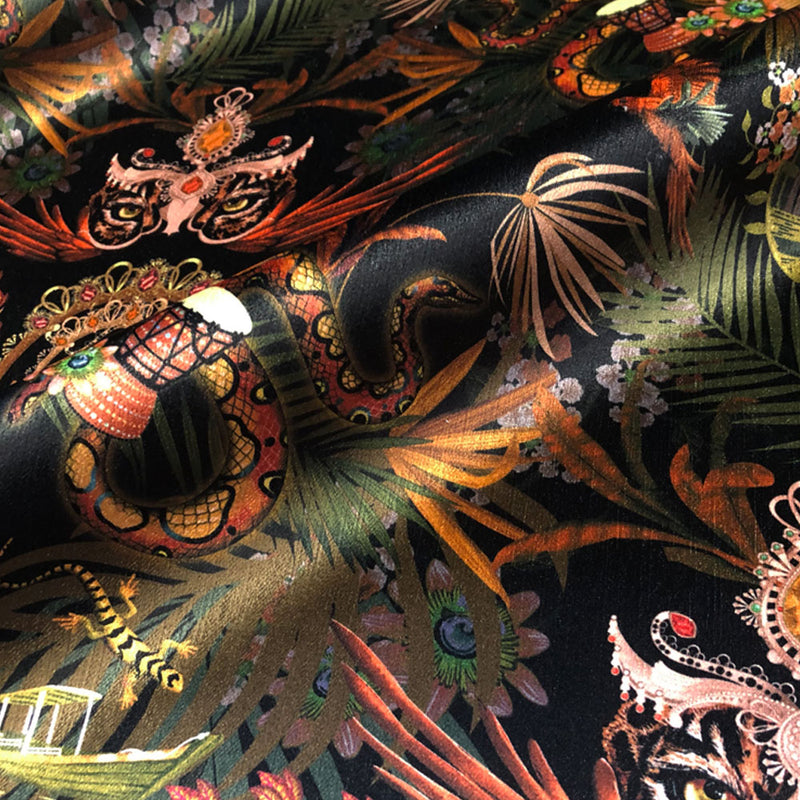 Luxury velvet fabric for upholstery and curtains with jungle print in Black & Gold