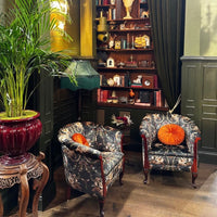 TV Show The Traitors Set Design by Celina Hodge with Upholstery Fabric Serpentined by Designer, Becca Who