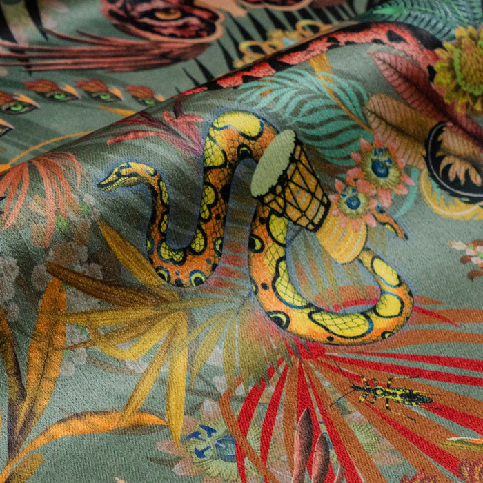 Detail of the rainbow boa on jade green jungle print velvet furnishing fabric