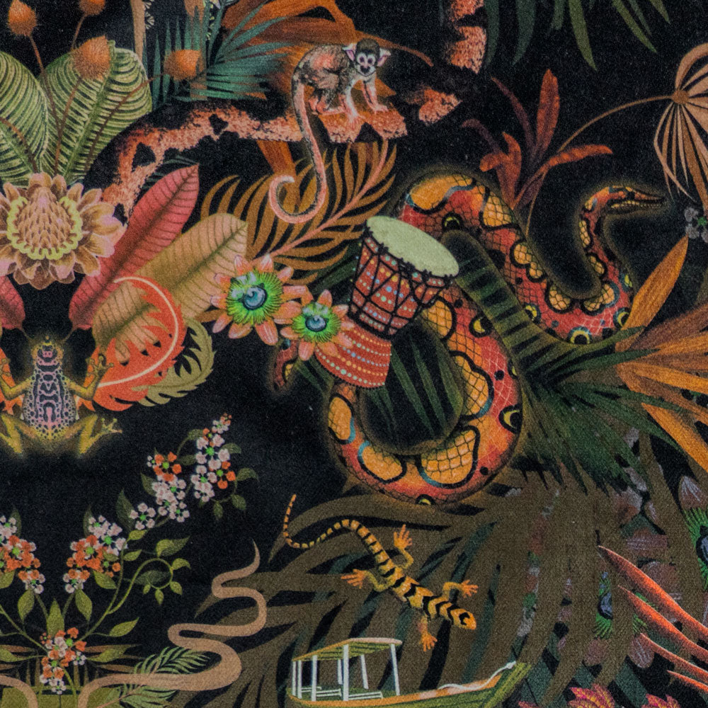 Detail of the gecko, frog and rainbow boa on black and gold jungle print velvet furnishing fabric