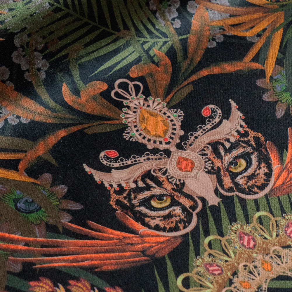 Close-up of the jaguar on Amazon Trip black and gold patterned velvet upholstery fabric