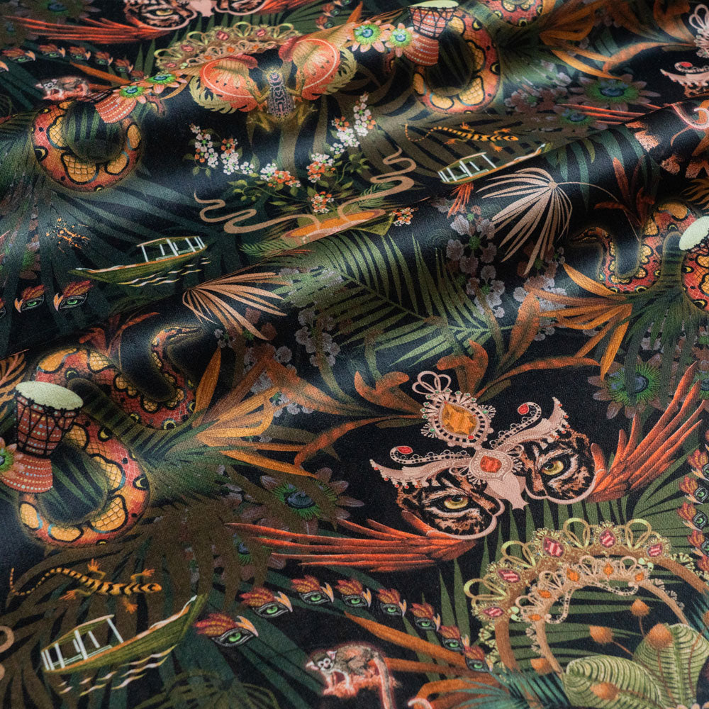 Amazon Trip velvet fabric in black and gold photographed at an angle to show the subtle sheen