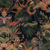 Close-up of the Amazon Trip artwork on black and gold patterned velvet upholstery fabric