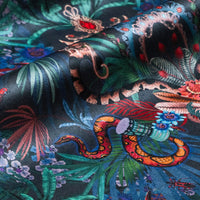 Amazon Trip velvet fabric in midnight blue photographed at an angle to show the subtle sheen