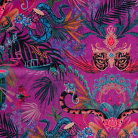 Pattern of jaguar, monkeys and Rainbow Boas among tropical flowers on Amazon Trip jungle print velvet fabric in violet
