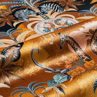Balloon Safari velvet fabric in mustard yellow photographed at an angle to show the subtle sheen