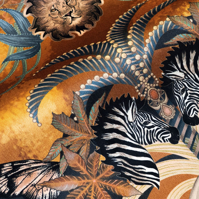 Close-up of the zebras and lion on Balloon Safari mustard yellow patterned velvet upholstery fabric