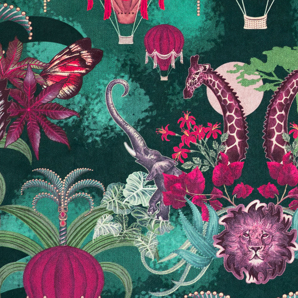Detail of the zebras and giraffes on emerald green African animal print velvet furnishing fabric