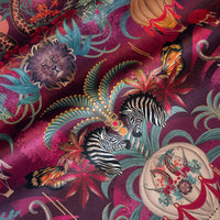 Balloon Safari pink and claret velvet fabric draped in soft folds, showing how the animal print falls for curtains and blinds