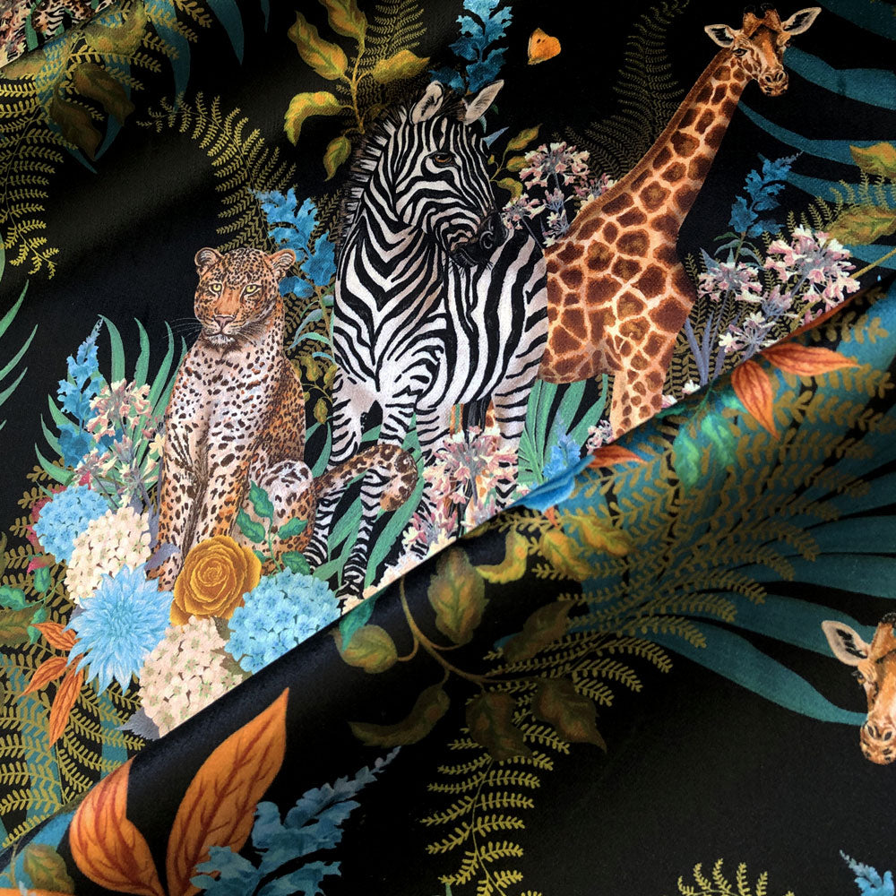 Zebra, Leopard and Giraffe design on Black Patterned Velvet Furnishing Fabric by Becca Who