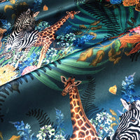 African Animals Upholstery Fabric in Blue by Becca Who