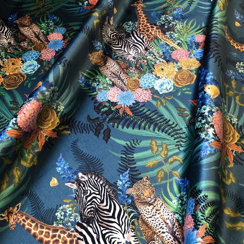 Colourful Furnishing Fabric with African Animals and Floral on Blue