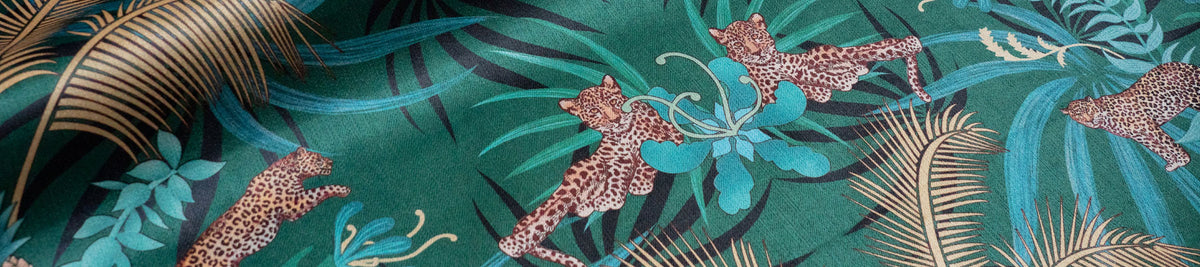 Close up of green velvet curtain fabric by designer Becca Who