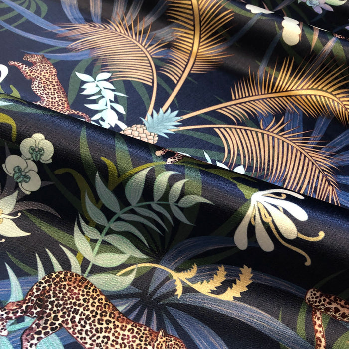 Bold and opulent Leopards Furnishing Fabric in Navy & Gold by UK Designer, Becca Who