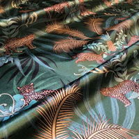 Green Designer Fabric with Leopards for Interiors, Upholstery and Soft Furnishings by Becca Who