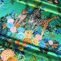 African Animals Upholstery Fabric in Emerald Green