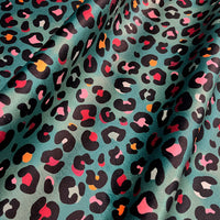 Colourful Green Leopard Animal Print Velvet Furnishing Fabric by UK Designer, Becca Who