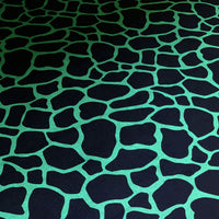 Giraffe Animal Print Velvet Furnishing Fabric in Green and Black