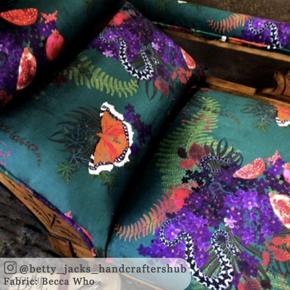 Dark Green Snakes Bold Patterned Velvet Fabric by Designer, Becca Who, close up on Chaise Longue