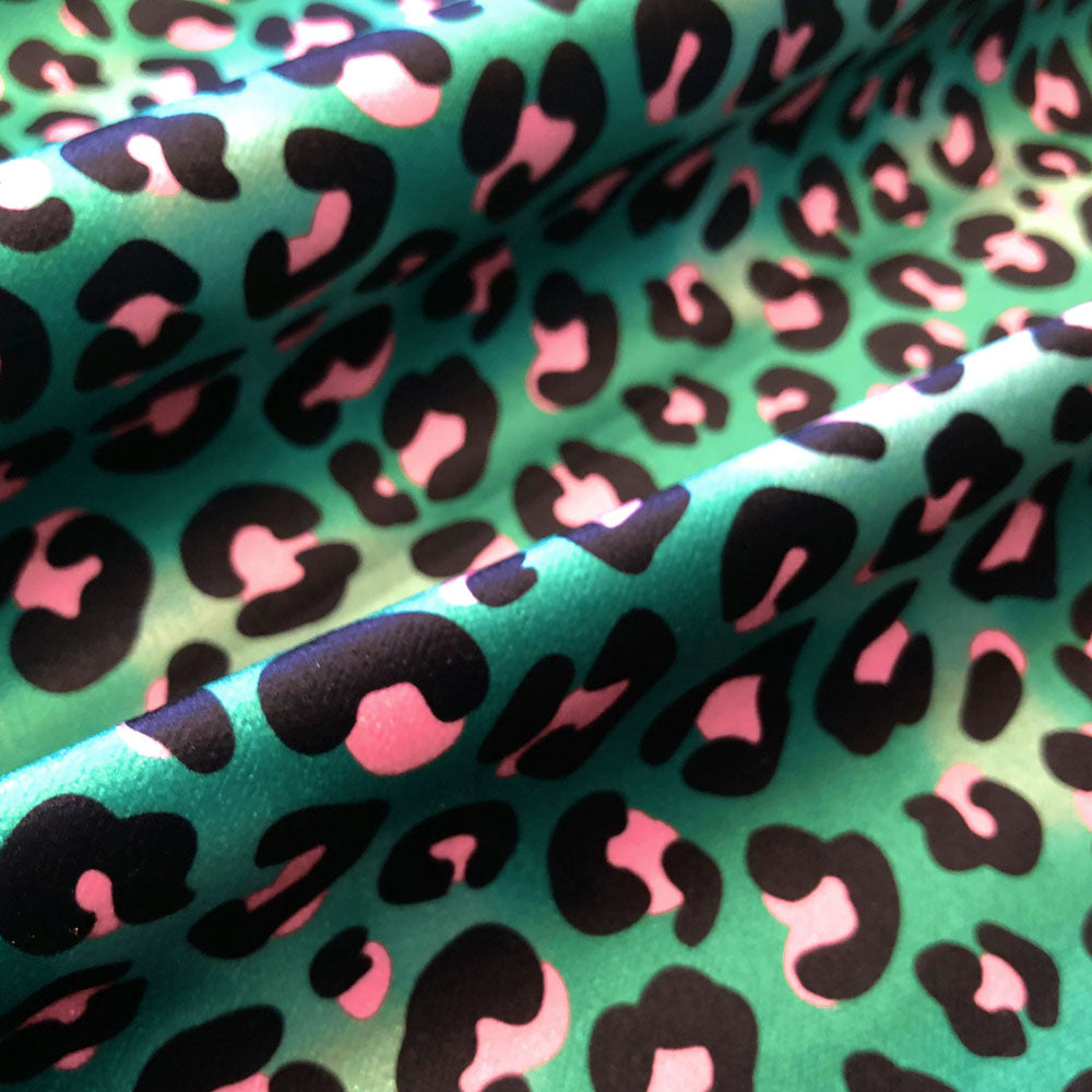 Colourful Animal Print Furnishing Fabric in Green & Pink