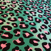 Green and Pink Leopard Print Velvet Furnishing Fabric by Becca Who