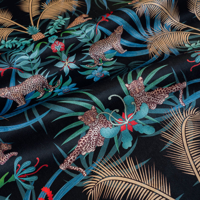 Leopard Luxe black and gold ornamental pattern designer velvet fabric by Becca Who, with leaping and lazing big cats among palms