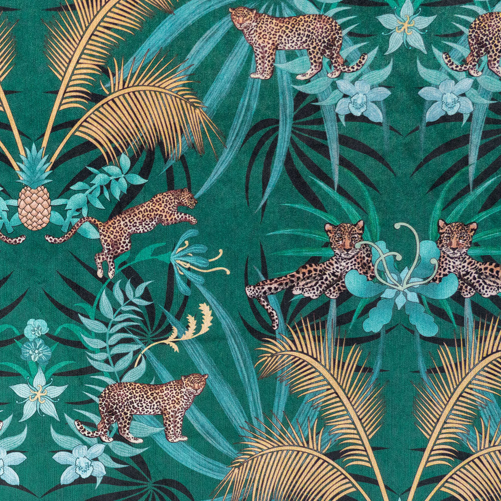 Detail of the leopards artwork pattern on green and gold ornamental pattern velvet furnishing fabric