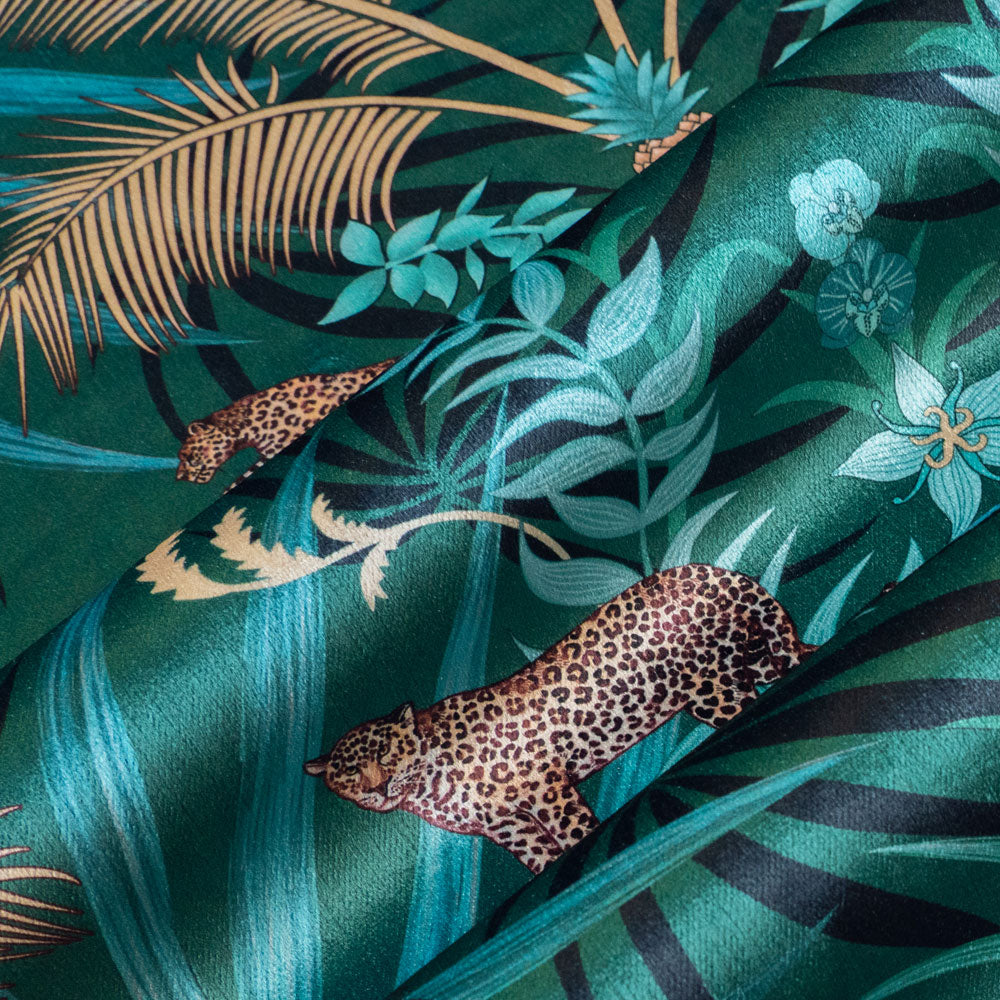Soft velvet pile and fine print detail on green and gold ornamental pattern fabric