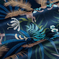Soft velvet pile and fine print detail on navy blue and gold ornamental pattern fabric