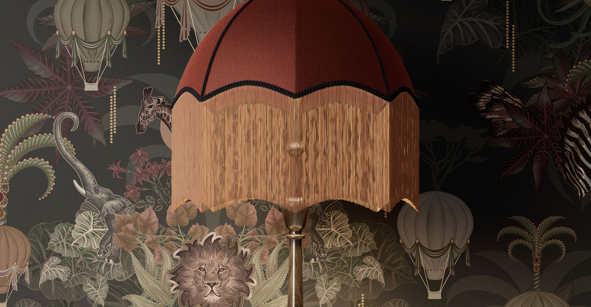 Living Room Wallpaper in dark, cosy hues on wall with lamp