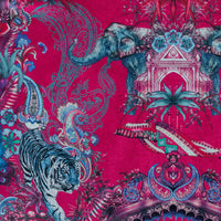 Close-up of elephant, tiger and paisley detailing on Magic Of India Indian wildlife print velvet fabric in bright pink