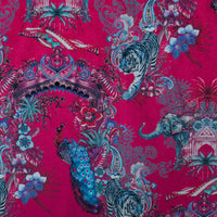 Close-up of the peacock and tigers on Magic Of India bright pink patterned velvet upholstery fabric