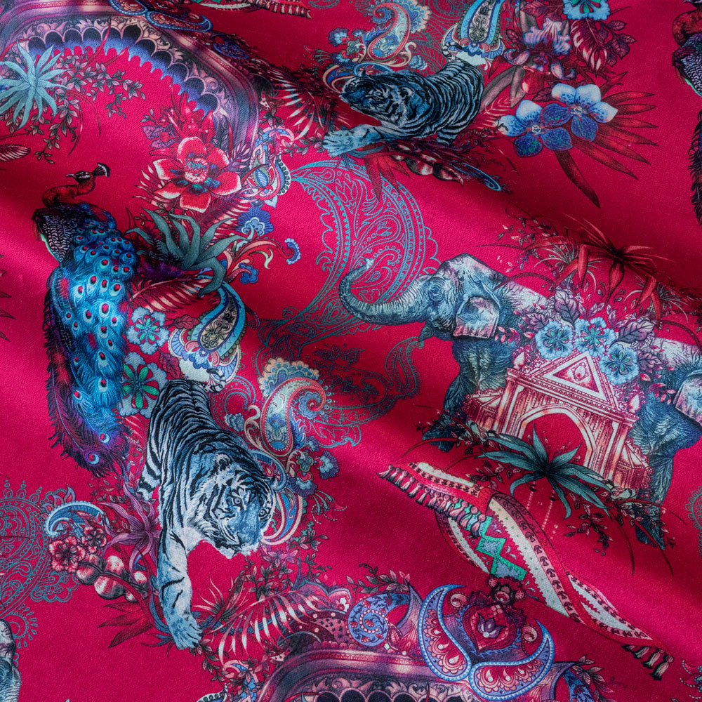 Magic Of India velvet fabric in bright pink photographed at an angle to show the subtle sheen