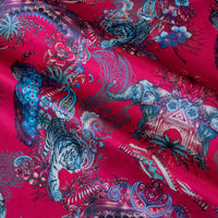 Magic Of India velvet fabric in bright pink photographed at an angle to show the subtle sheen