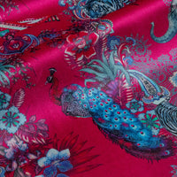 Magic Of India velvet fabric in bright pink photographed at an angle to show the subtle sheen