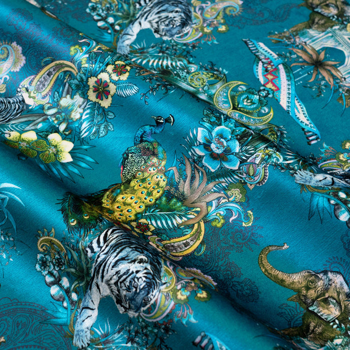 Magic Of India teal blue Indian wildlife print designer velvet fabric by Becca Who, with a peacock, Bengal tigers and elephants with paisley detailing