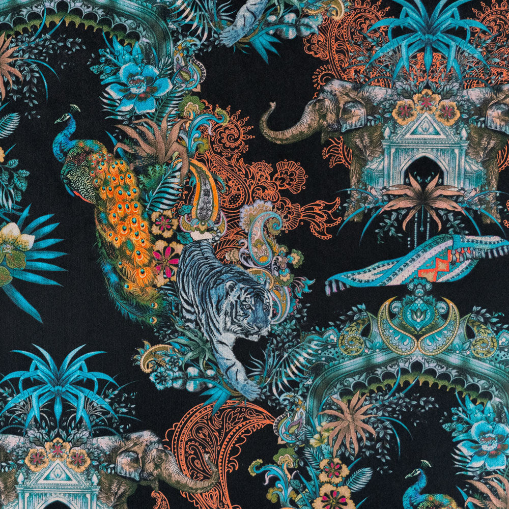 Detail of the artwork pattern on black Indian wildlife print velvet furnishing fabric