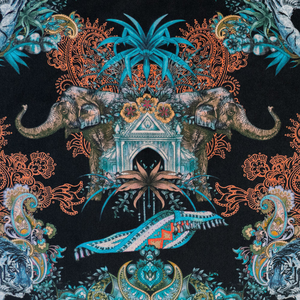 Close-up of elephant and paisley detailing on Magic Of India Indian wildlife print velvet fabric in black