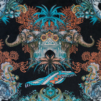 Close-up of elephant and paisley detailing on Magic Of India Indian wildlife print velvet fabric in black