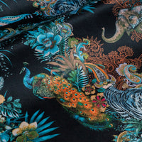 Close-up of the peacock on Magic Of India black patterned velvet upholstery fabric