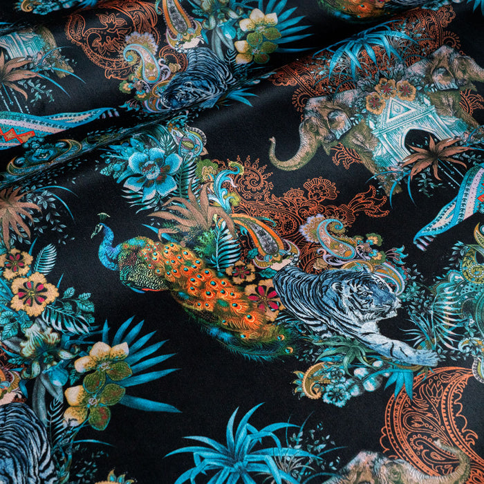 Magic Of India black Indian wildlife print designer velvet fabric by Becca Who, with a peacock, Bengal tigers and elephants with paisley detailing