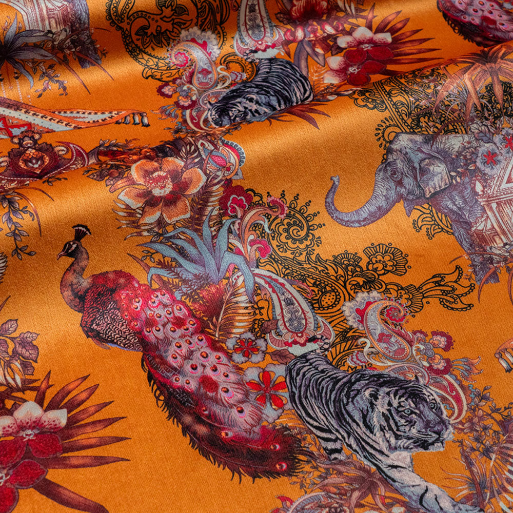 Magic Of India orange yellow Indian wildlife print designer velvet fabric by Becca Who, with a peacock, Bengal tigers and elephants with paisley detailing