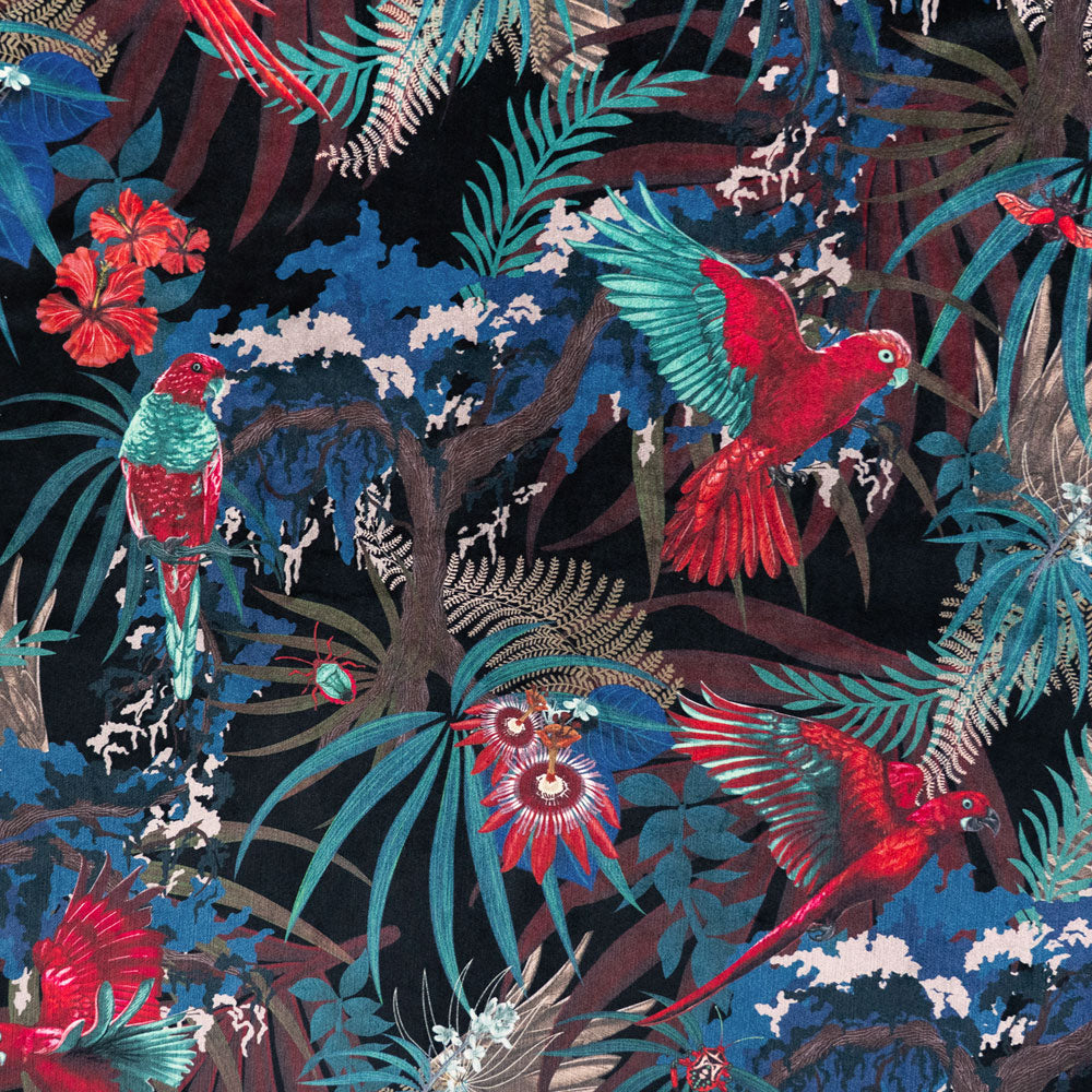 Detail of the pattern on black red and gold tropical bird print velvet furnishing fabric
