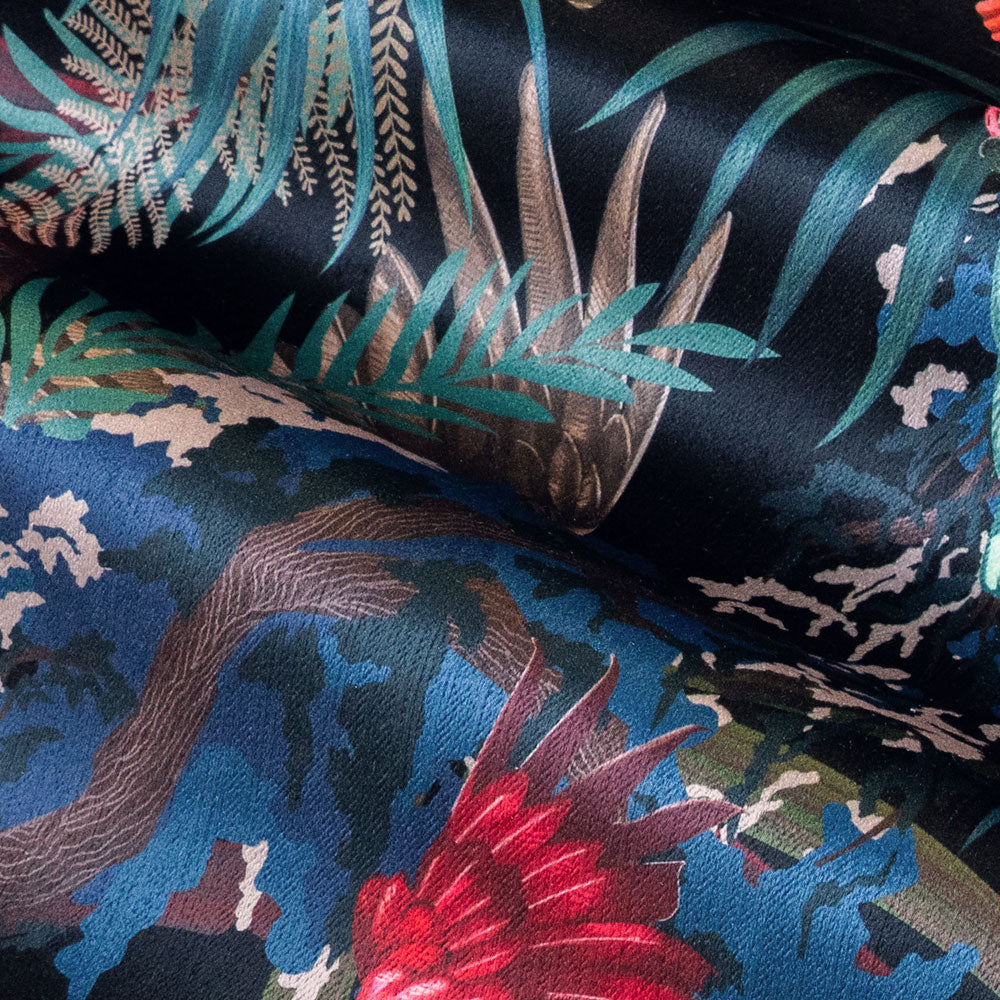 Soft velvet pile and fine print detail on black red and gold tropical bird print fabric