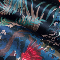 Soft velvet pile and fine print detail on black red and gold tropical bird print fabric