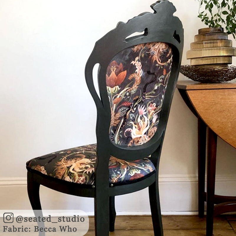 Snakes Patterned Velvet Fabric in Charcoal by Designer, Becca Who, upholstered on chair