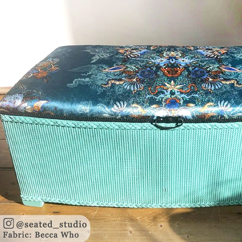 Teal patterned ottoman in Becca Who fabric