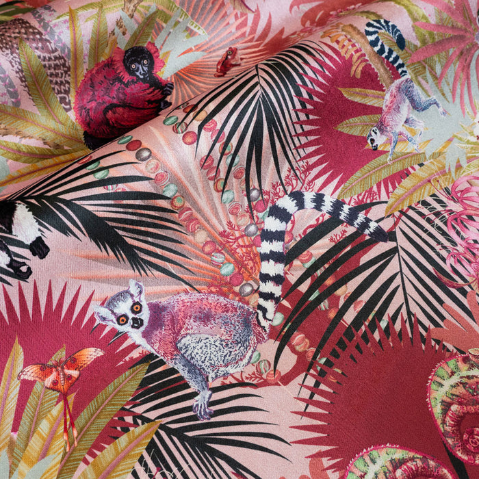 Close-up of the ring-tailed lemur on Treetop Tango dawn pink patterned velvet upholstery fabric