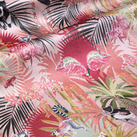 Treetop Tango dawn pink velvet fabric draped in soft folds, showing how the lemur print falls for curtains and blinds