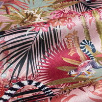 Close up of soft velvet pile and fine print detail on dawn pink lemur print fabric